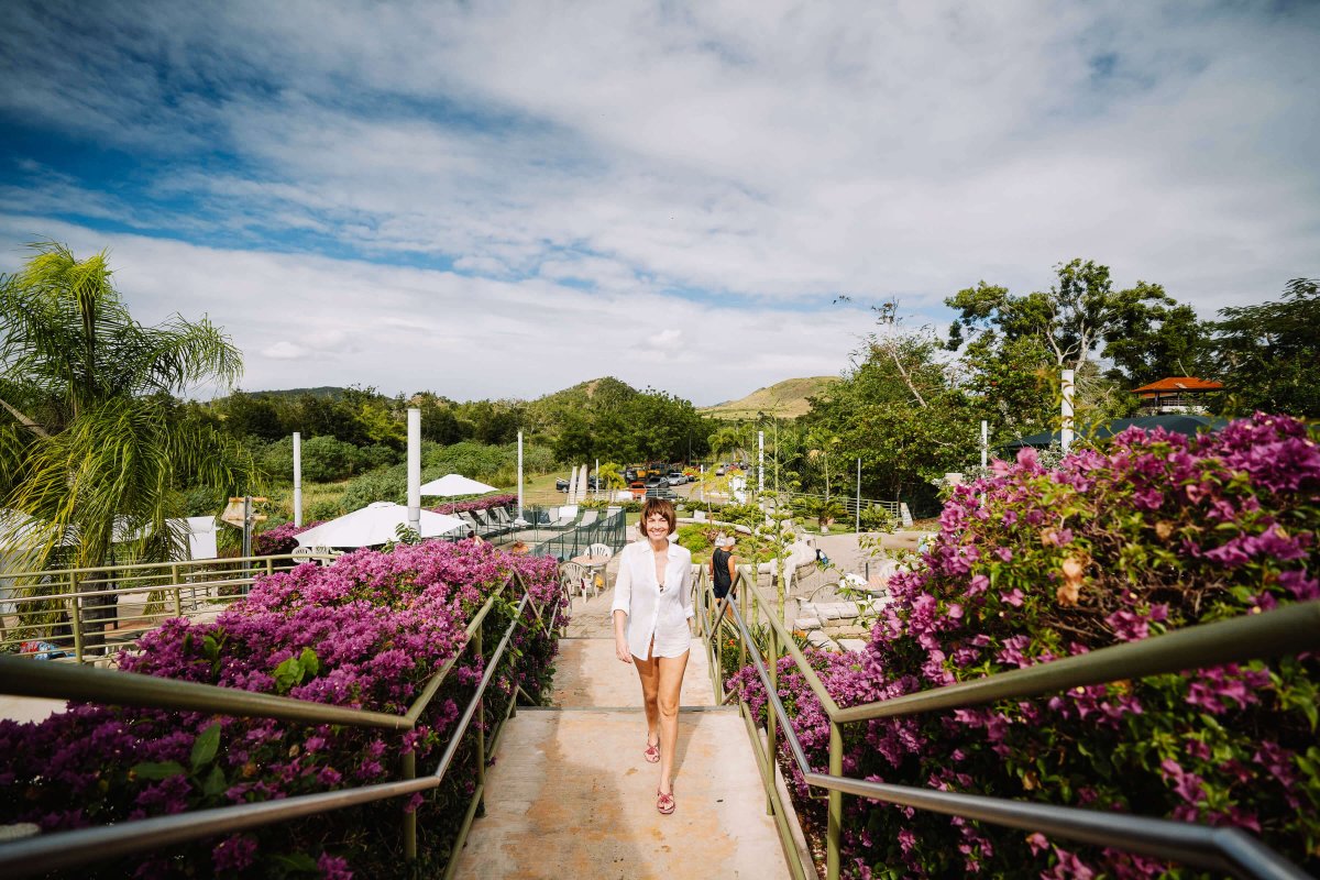 A woman walking along the Hot Springs in  Coamo.