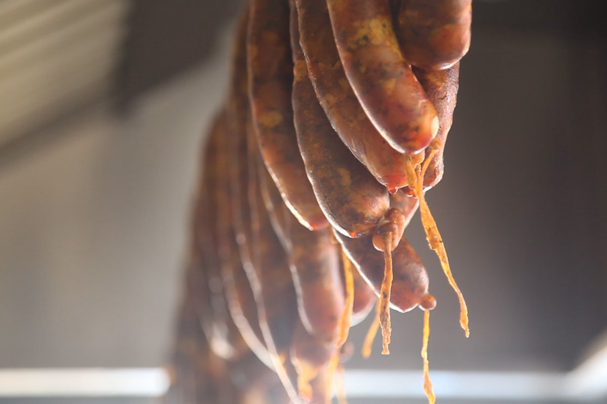 Traditional longaniza sausage hangs at a restaurant in Orocovis.