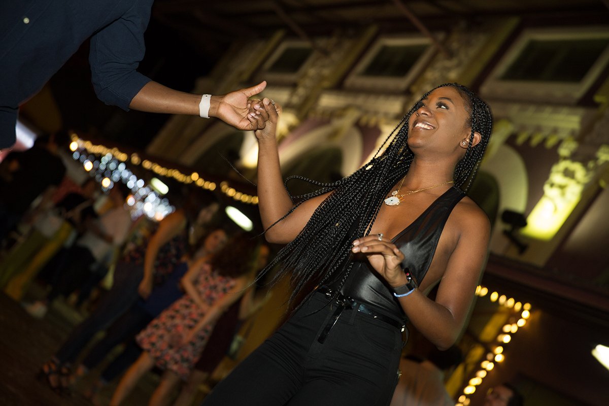 A woman dances at La Placita de Santurce