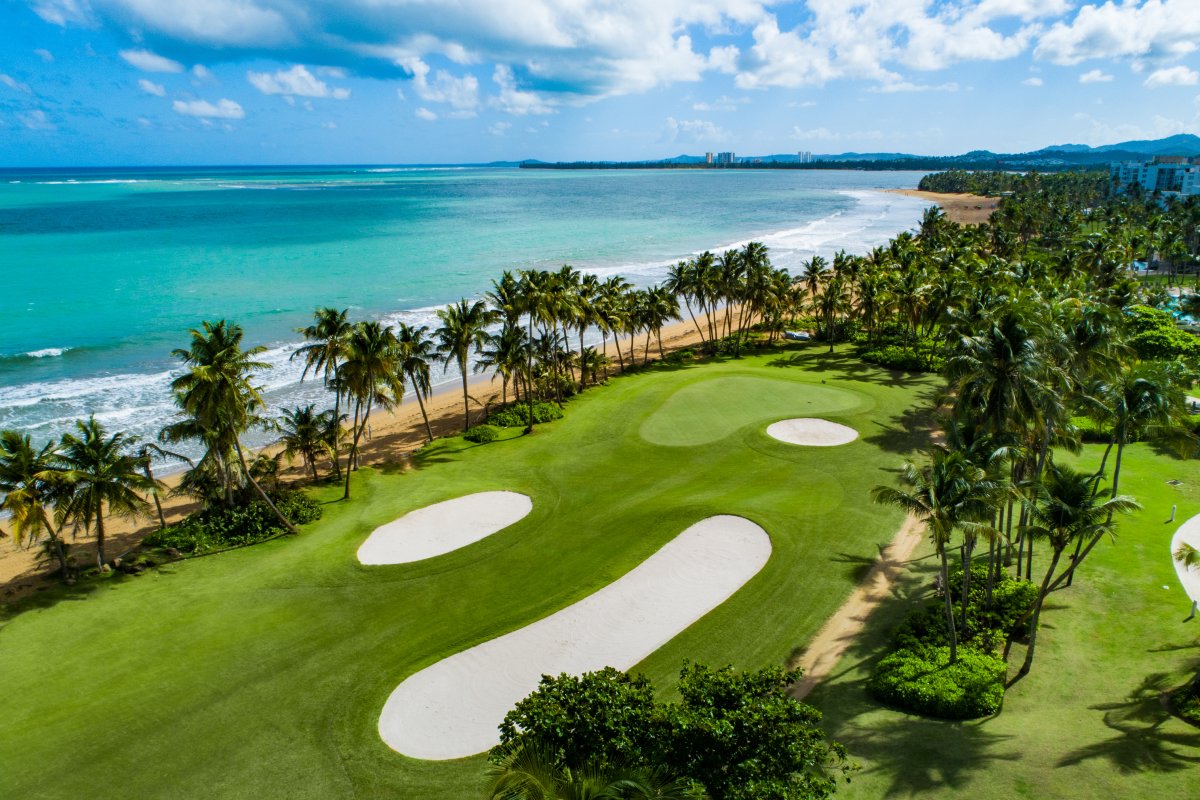 An aerial view of the oceanfront golf course at Wyndham Grand Rio Mar in Rio Grande, Puerto Rico.