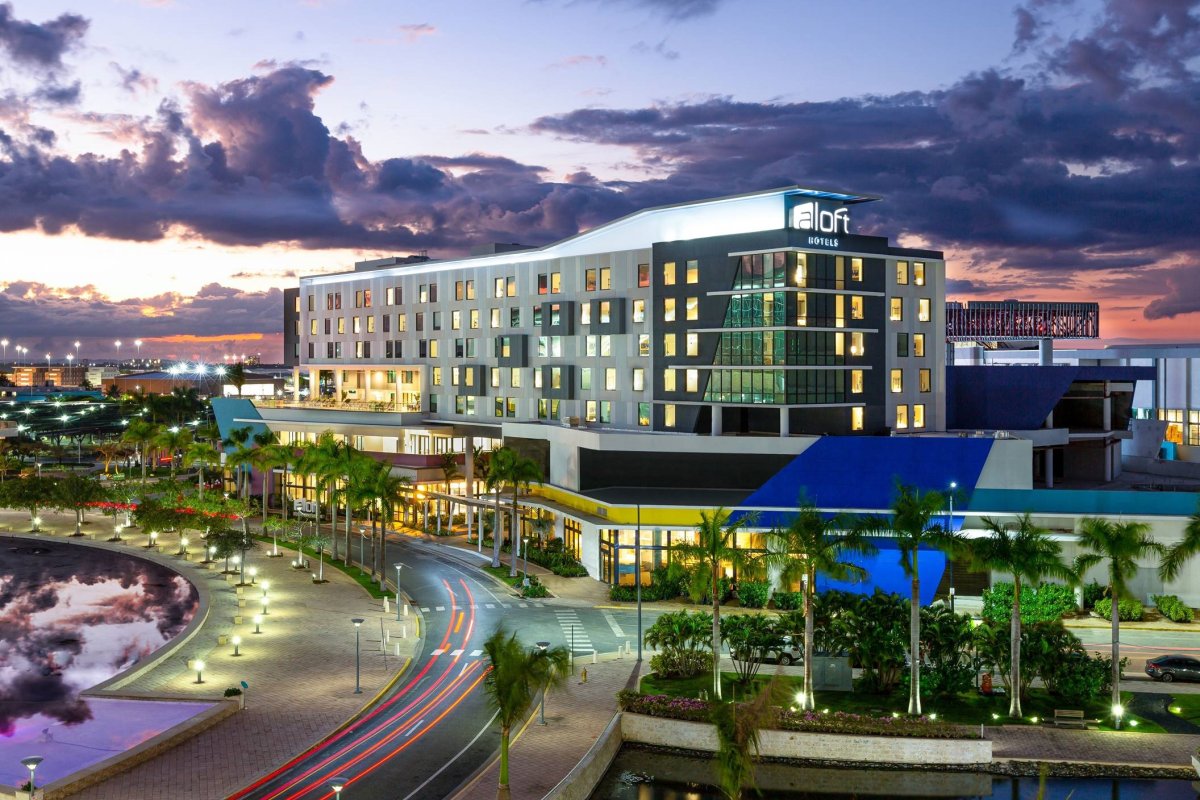 Outside view of the Aloft hotel building in a urban setting