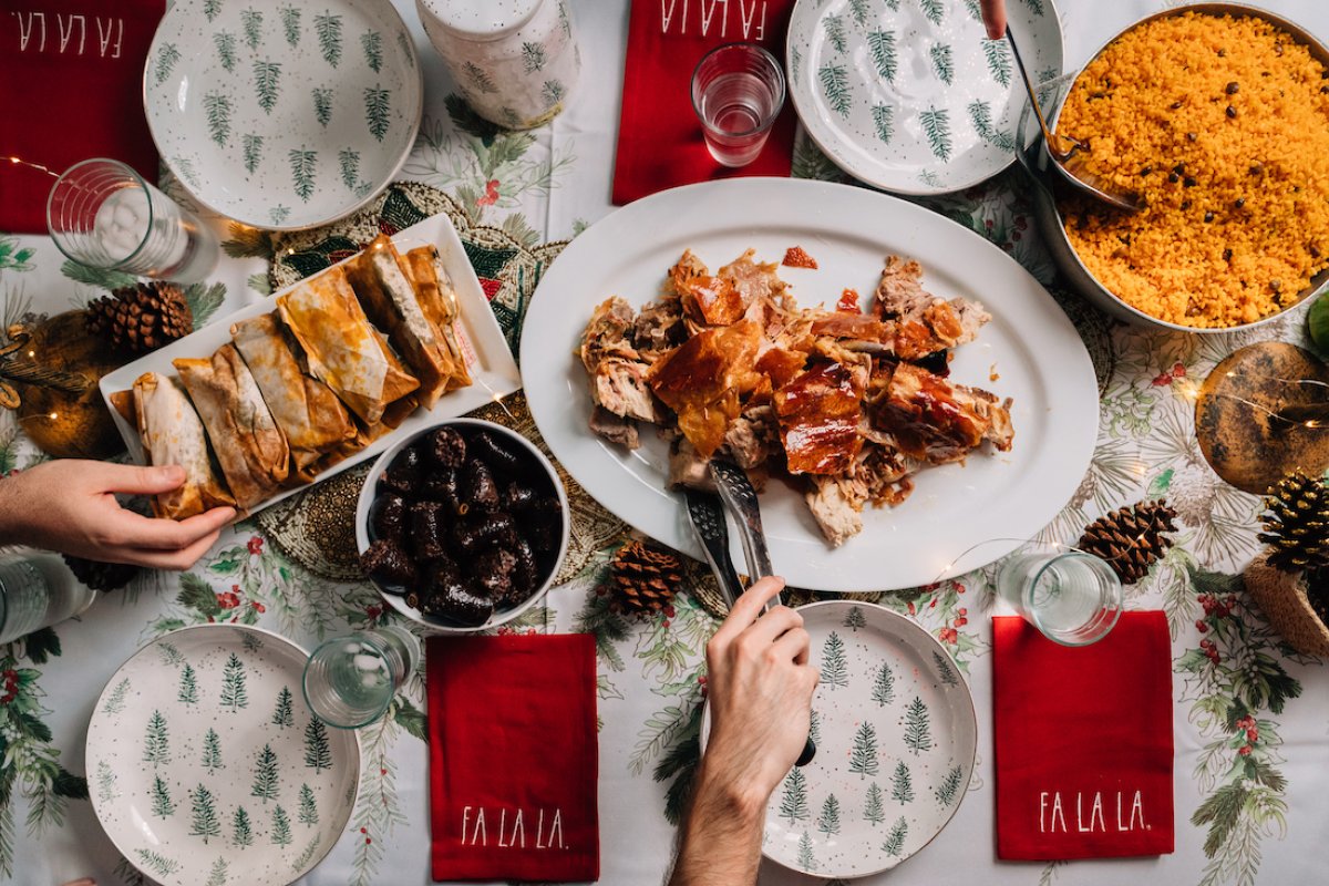 The holiday menu in Puerto Rico includes local favorites like pernil, arroz con gandules, pasteles, tembleque, and arroz con dulce. 