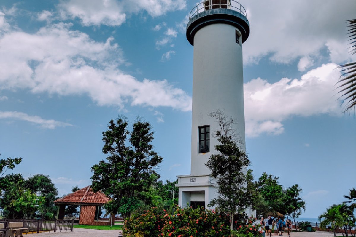 The spacious grounds of the Faro de Punta Higüera are great for watching surfers ride Atlantic Ocean waves.