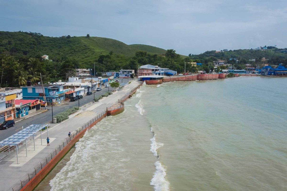 Aerial view of Malecón de La Playa Hucares (el Malecón de Naguabo), an iconic boardwalk lined with restaurants and food kiosks. Naguabo, Puerto Rico.