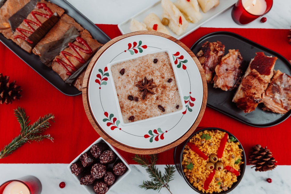 An array of rice, pasteles, and lechon