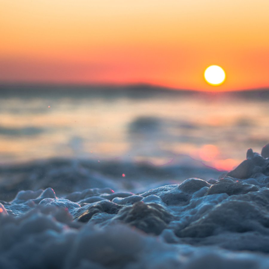 The sun sets over the ocean on La Parguera beach.