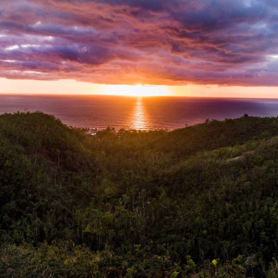 A dramatic sunset over the ocean from puntas rincon in western puerto rico