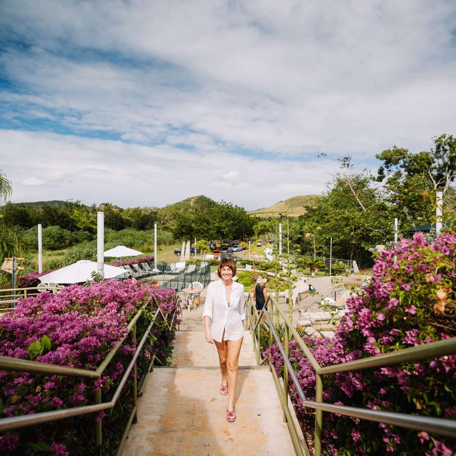 A woman walking along the Hot Springs in  Coamo.