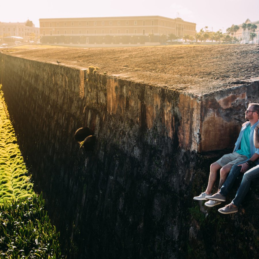 A couple enjoys the view from old ruins