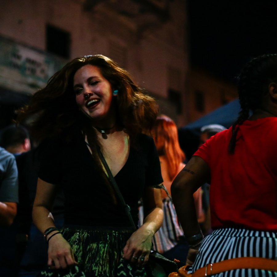 A woman dances at a nightlife spot in San Juan.