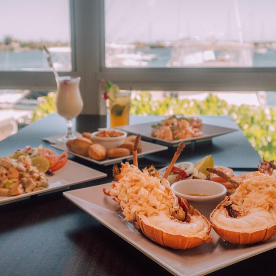 Lobster and other seafood on an outdoor table at El Dorado Restaurant in Salinas.