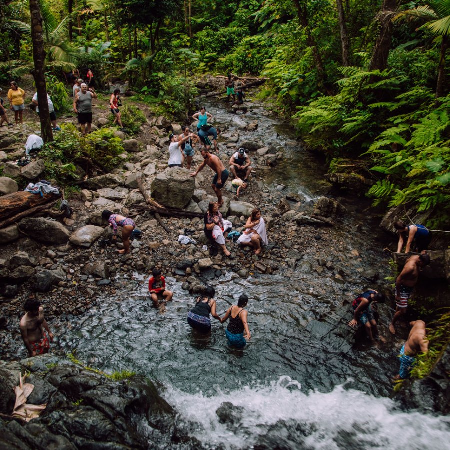 A youth group visits El Yunque and its natural pools.