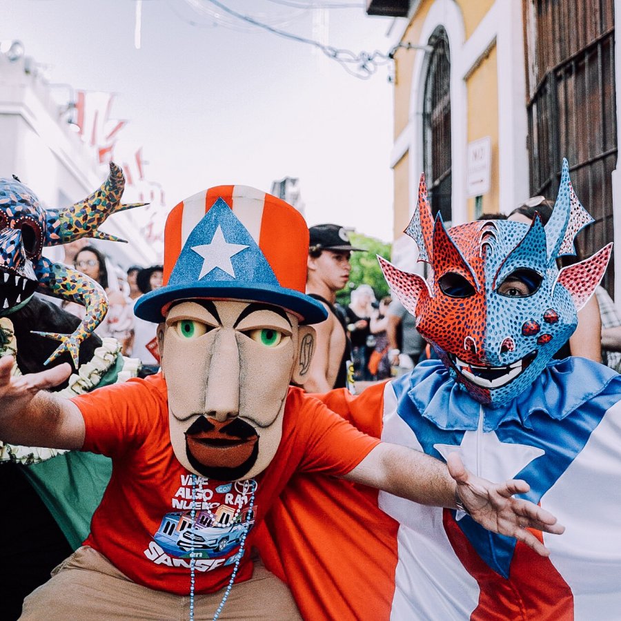 People outside in colorful costumes.