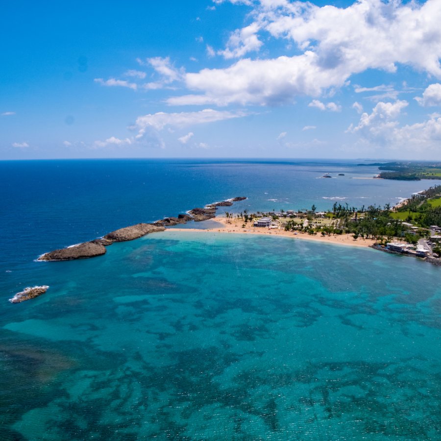 An aerial view of the blue waters of Mar Bella beach in Vega Baja. 