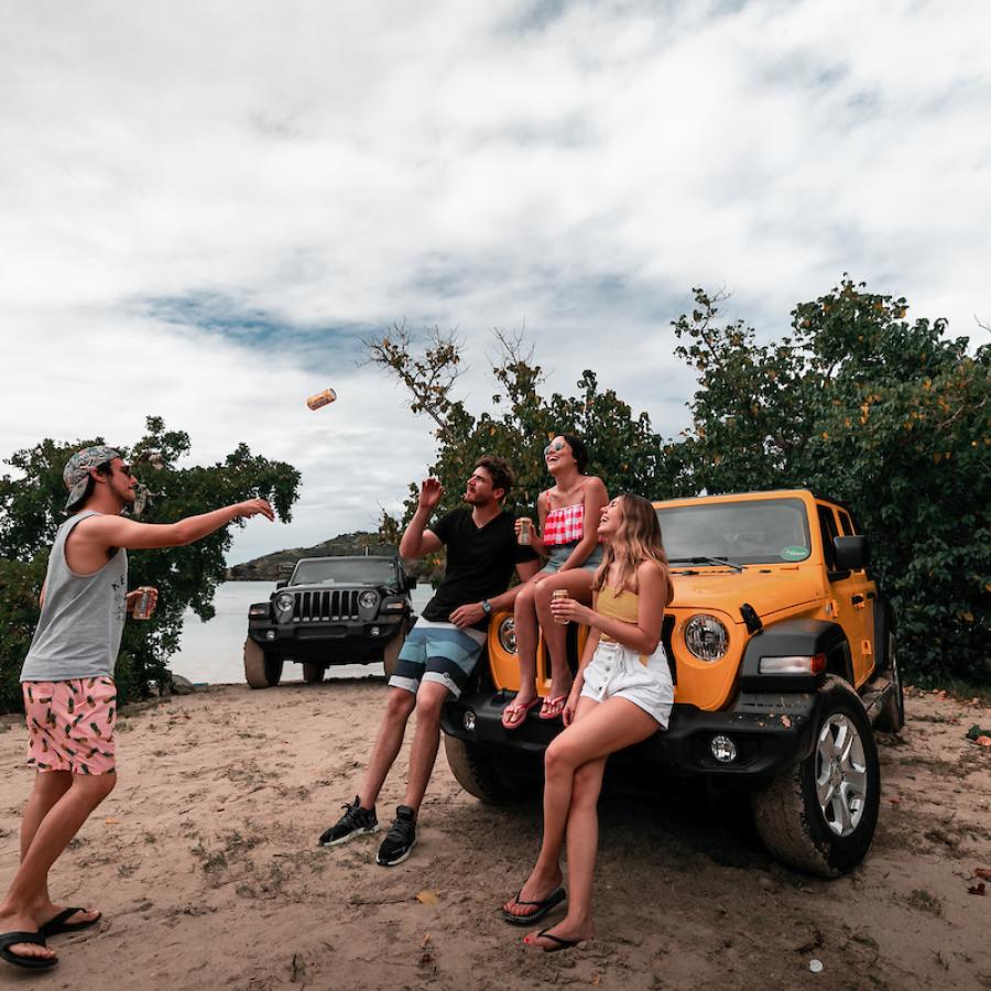 A group of friends talking during their road trip around Culebra. 