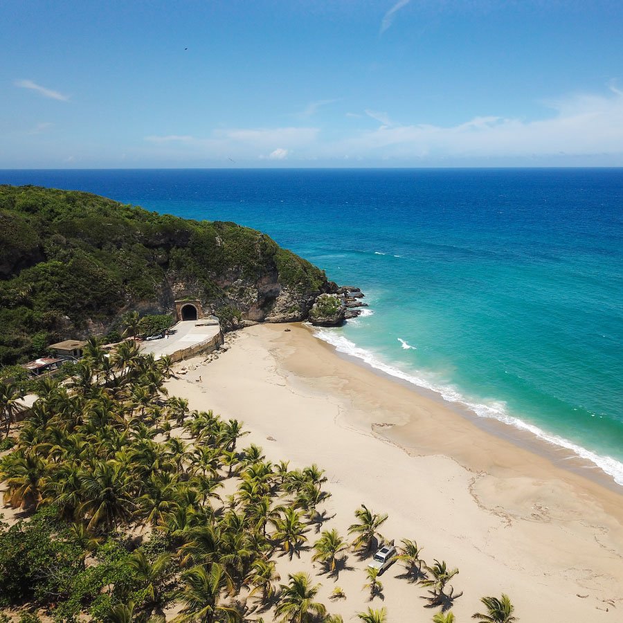 Aerial view of Tunel de Guajataca, where a former railroad tunnel meets the beach.