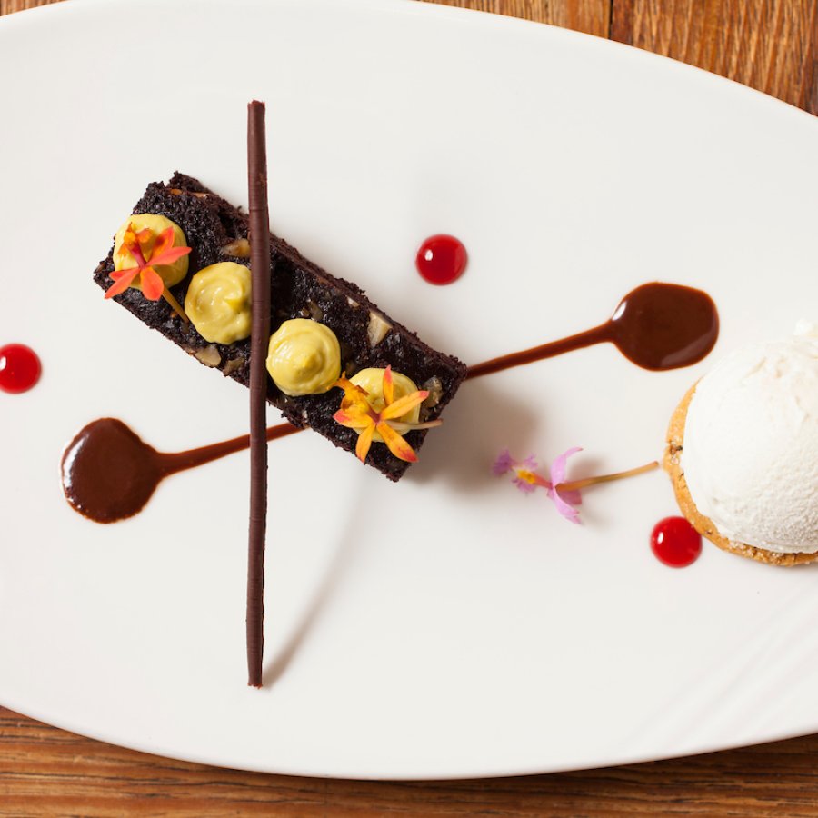 A chocolate-based dessert highlights different shapes and textures.