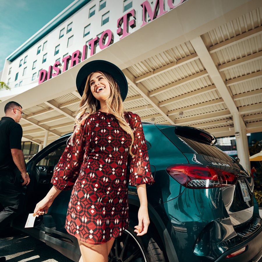 Woman getting out of car.