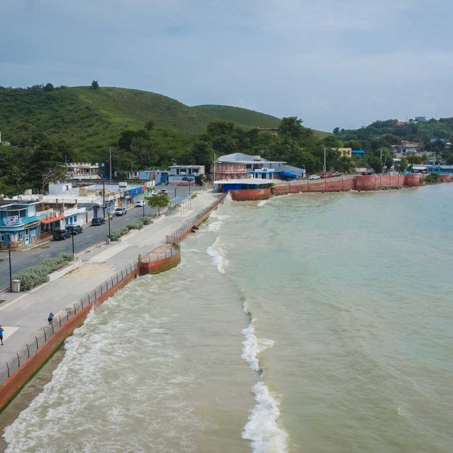 Aerial view of Malecón de La Playa Hucares (el Malecón de Naguabo), an iconic boardwalk lined with restaurants and food kiosks. Naguabo, Puerto Rico.