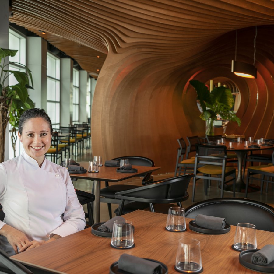 Chef Carol Reyes in Boveda dinning area.