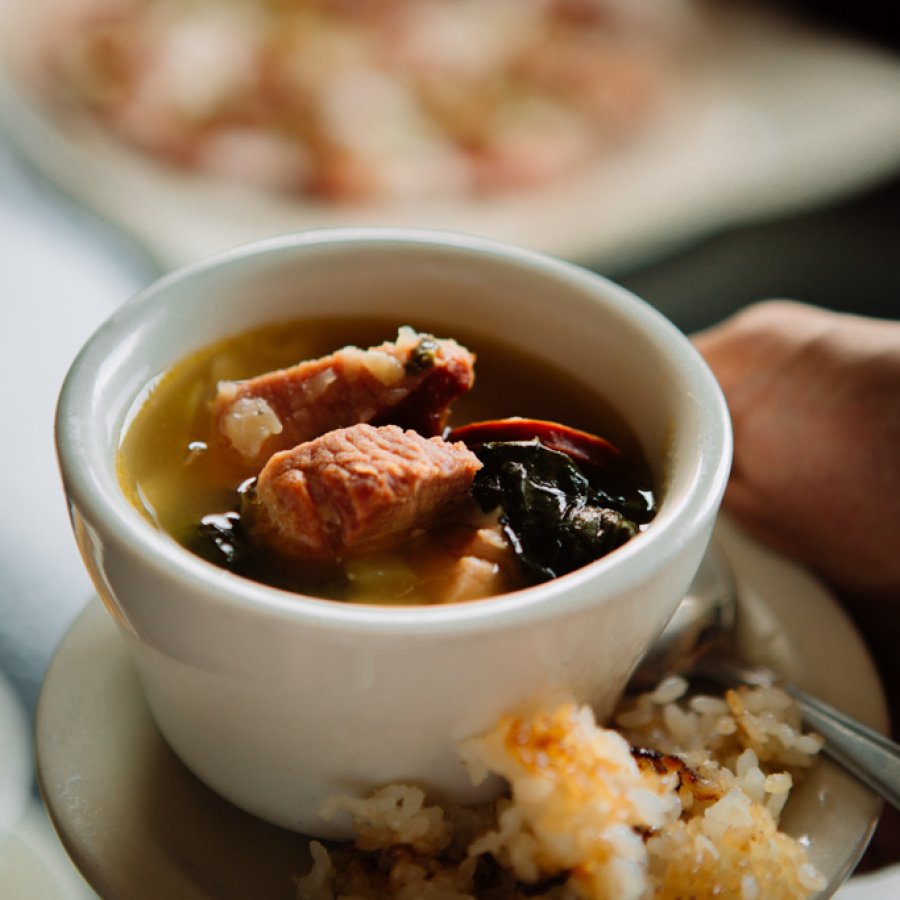 Photo of sancocho stew and rice.