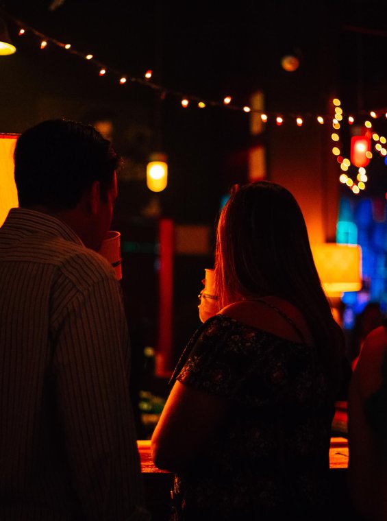 People enjoying a drink and music at La Respuesta 